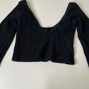 Out from under black long sleeve tank top